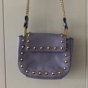 Small cross body luxury bag, light purple with gold color chain